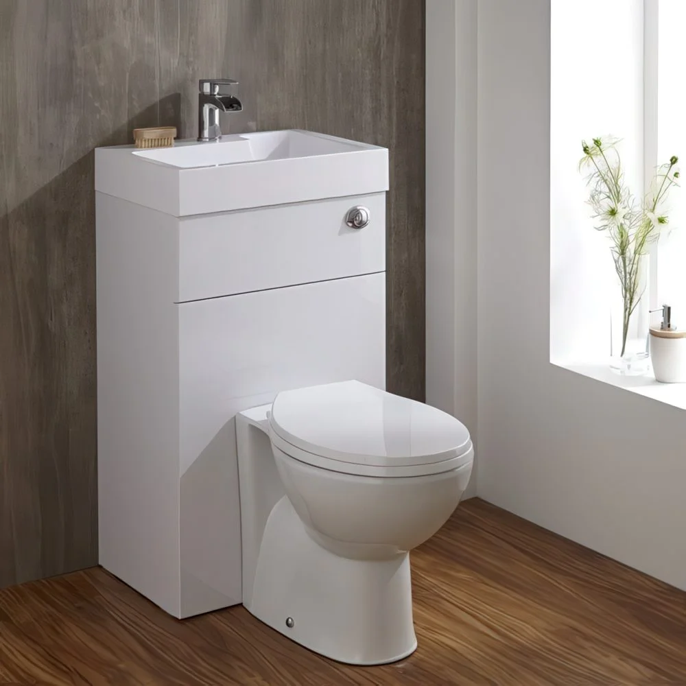Küçük banyolar için modern tuvalet ve lavabo ünitesi.