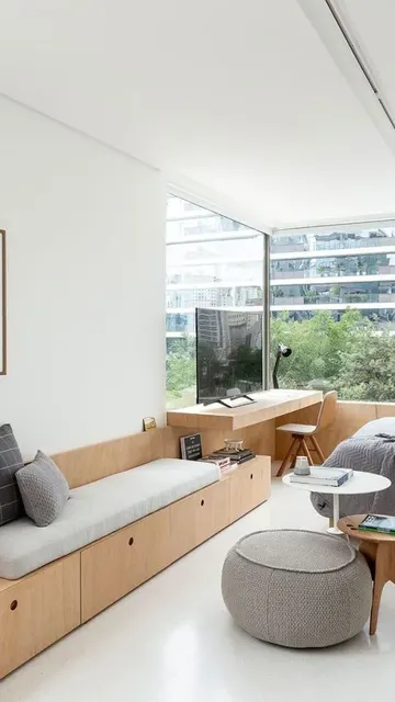 Uzatılmış döşemeli bu depolama daybed'i, modern veya minimal oturma odaları için harika bir fikir.