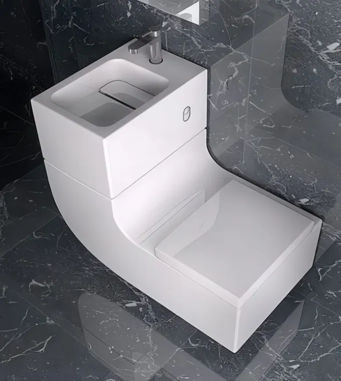 Şık kavisli tuvalet ve lavabo kombini.