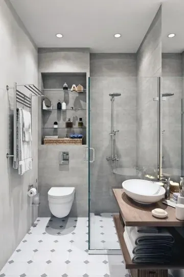 Beton duvarlı, karolu zeminli küçük minimalist banyo, askılı açık lavabo ve tuvaletin üzerindeki gömme raflar.