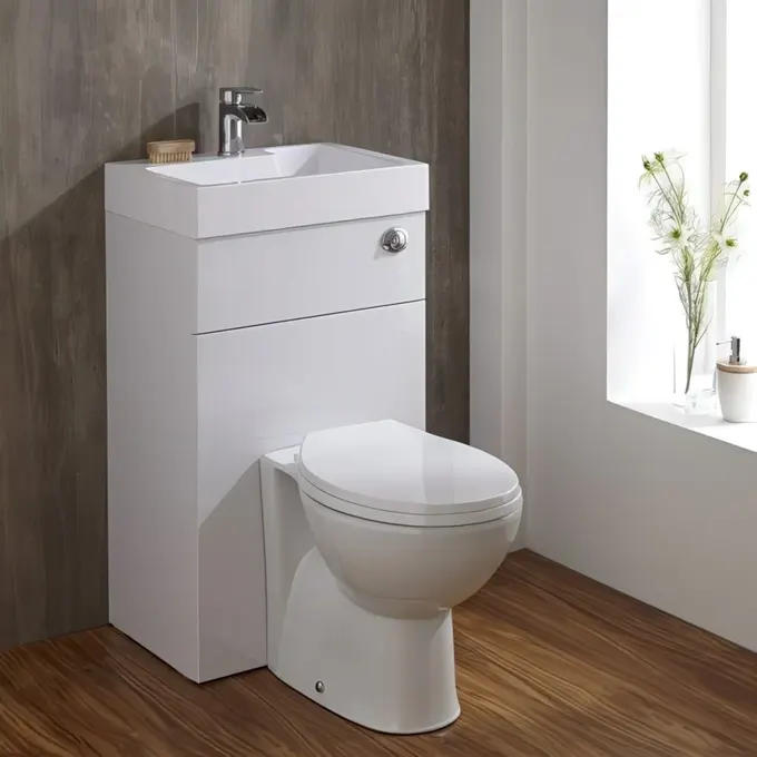Küçük banyolar için modern tuvalet ve lavabo ünitesi.
